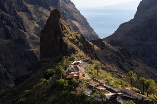 Aerial view of Masca village nestled in a dramatic mountain gorge, Tenerife, Canary Islands